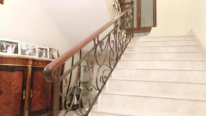 Artistic  Wrought iron hand railing with polish wooden hand rest - General Metal Works Malta